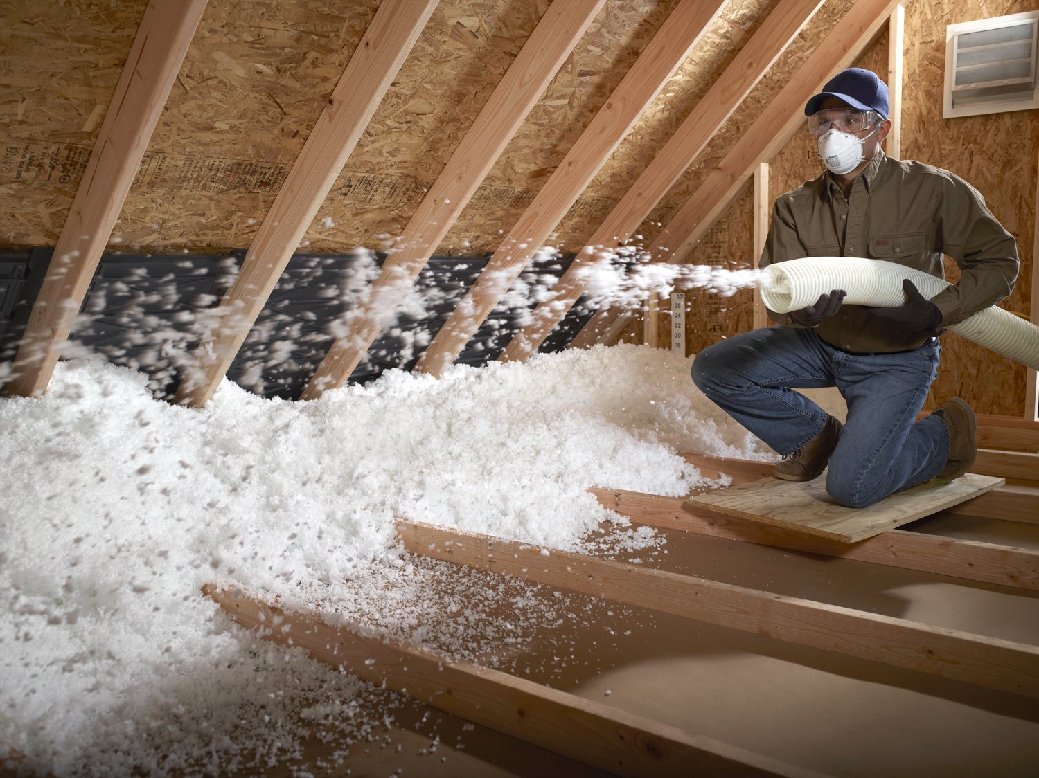 attic insulation install in progress